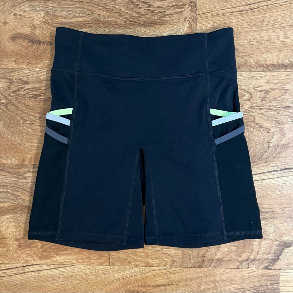 Fabletics High-Waisted Motion 365 Pocket Biker Shorts 7”